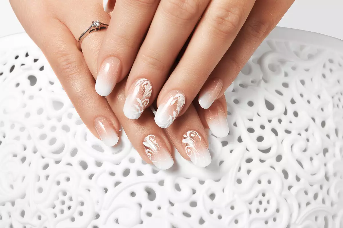 White drawing female nails.