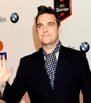 Robbie Williams se mută înapoi în Marea Britanie