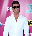 Simon Cowell vrea să asiste la naşterea copilului său