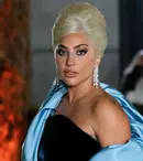 Lady Gaga a pozat goală pentru revista Vogue. Și-a lăsat toate tatuajele la vedere