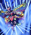 Fluturele de la „Masked Singer România” și-a dezvăluit identitatea chiar înainte de finală
