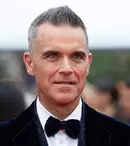 Motivul pentru care copiii lui Robbie Williams nu au telefoane mobile. Decizia artistului este una clară: „Cum aș putea să dau acest drog unui copil?”