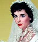 Rochiile de mireasă ale lui Elizabeth Taylor, scoase la licitaţie