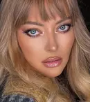 Dintr-o fetiță timidă, o divă nonconformistă. Transformarea spectaculoasă a Deliei. Cum arăta artista în copilărie