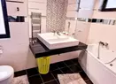 Cum arată vila din Pipera pe care Brigitte Patramă o scoate la vânzare și cât cere pe ea. Are trei etaje, cinci dormitoare, grădină, piscină și jacuzzi