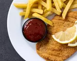 Ce să pui în făina pentru șnițel ca să iasă pufos și gustos. Ingredientul banal care schimbă complet textura preparatului