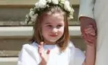 Prințesa Charlotte, surprinsă într-o ipostază adorabilă la nunta regală. Cum a fost fotografiată?