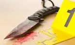 Un român din Spania i-a tăiat gâtul fratelui său care venise să-l viziteze din România