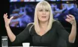 Cine e femeia în verde care a așteptat-o pe Elena Udrea la ieșirea din închisoare. I-a adus un buchet cu flori și a îmbrățișat-o