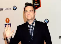 Robbie Williams se mută înapoi în Marea Britanie