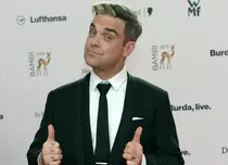 Robbie Williams se înfometează pentru a slăbi
