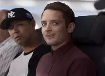 Elijah Wood și Peter Jackson, într-o reclamă la Air New Zealand