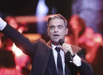 Robbie Williams şi-a scos obiectele personale la licitaţie
