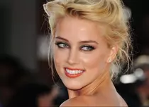 Amber Heard flirtează cu un miliardar