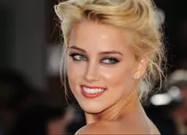 Amber Heard flirtează cu un miliardar