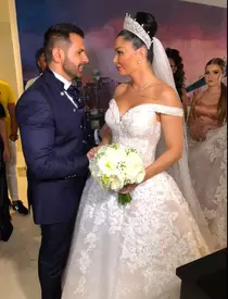 Brigitte și Florin, în ziua nunții lor. Mireasa a purtat o rochie în valoare de 10.000 de euro!