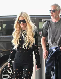 Jessica Simpson Radiantly Smiles & Waves In A Fashionably Funky Outfit While Out In Thousand Oaks, CA.