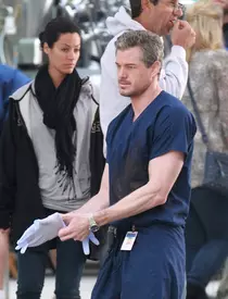 Eric Dane takes off his gloves after filming an emotionally charged scene with co-star Chlyer Leigh in Downtown LA