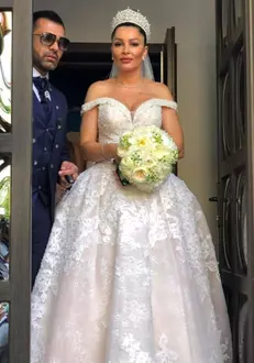 Brigitte și Florin, în ziua nunții lor. Mireasa a purtat o rochie în valoare de 10.000 de euro!