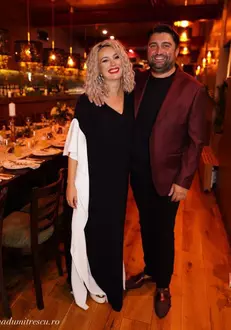 Diana Dumitrescu și soțul ei, la botezul fiului lor