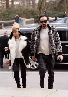 Nicolas Cage and his girlfriend matching black leather pants while going insid THE American Museum of Natural History
