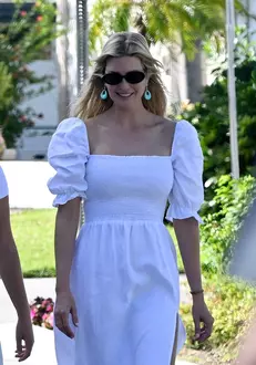 PREMIUM EXCLUSIVE: Ivanka Trump shows off her shapely legs in a see-through white cotton dress, split to the thigh, as she and husband Jared Kushner walk to a Miami synagogue with their children to mark the Jewish holiday Simchat Torah