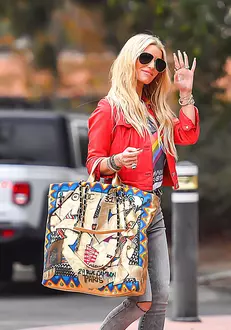 Jessica Simpson Radiantly Smiles & Waves In A Fashionably Funky Outfit While Out In Thousand Oaks, CA.