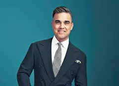 Robbie Williams va fi protagonistul unui film biografic