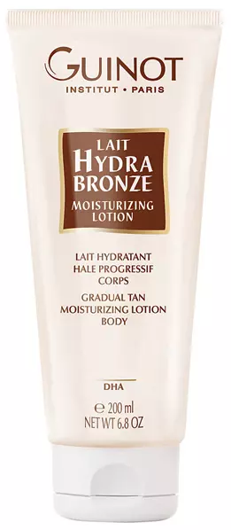 Lapte hidratant pentru corp cu efect de bronzare treptată Guinot, 106 lei