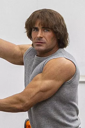 PREMIUM EXCLUSIVE:  Zac Efron rocks daisy duke style shorts as he shows off his astonishingly buff physique during filming for The Iron Claw in Louisiana with British actress Lily James