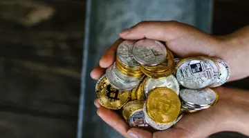 Gest inedit de protest: a plătit impozitul cu cinci kilograme de monede! Cum au reacționat angajații de la administraţia financiară?