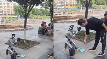 Un robot umanoid de 14.000 de euro a ieșit la cerșit și spune că nu mai are bani să se încarce, pe o stradă aglomerată din China