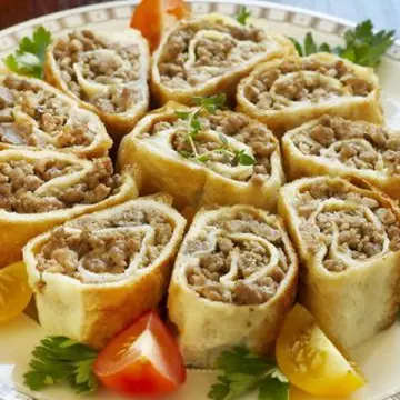 Rulouri de omletă cu carne de viţel