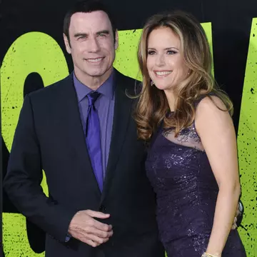 Foto: Ce pupăcioşi sunt John Travolta şi Kelly Preston, în public!