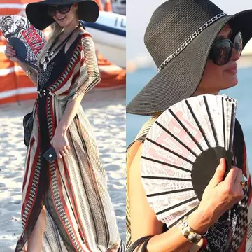 Poze: Vezi cum s-a îmbrăcat Paris Hilton la plajă!