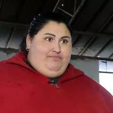 Cea mai grasă femeie din România a slăbit 109 kilograme şi poartă rochii şi pantofi cu toc