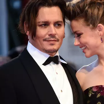 Amber Heard i-a cerut divorțul lui Johnny Depp