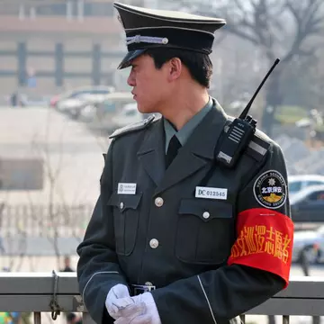 O femeie a încercat să își dea foc în fața ambasadei SUA la Beijing