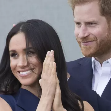 Meghan Markle, primele fotografii cu burtica de gravidă