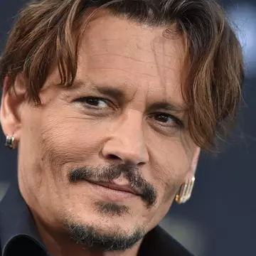 Johnny Depp a sărbătorit cu mâncare indiană victoria împotriva lui Amber Heard