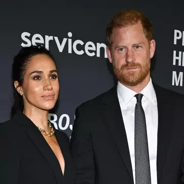 Meghan Markle, într-un costum de peste 6.500 euro și bijuterii de peste 26.000 de euro, la un eveniment