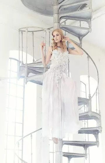 blond-female-steps-long-white-dress_613910-7648