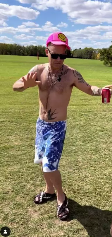 cum-arata-robbie-williams-dupa-ce-a-slabit-2