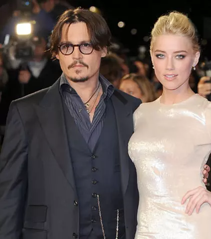 Amber Heard este furioasă că Johnny Depp blochează divorțul
