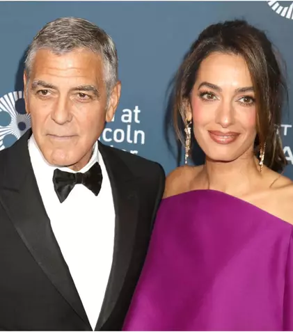 Imaginea zilei: George și Amal Clooney, față în față cu Donald Tusk. Declarația surprinzătoare a premierului polonez după întâlnirea cu celebrul cuplu