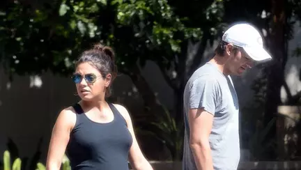 Mila Kunis nu-și mai poate ascunde burtica