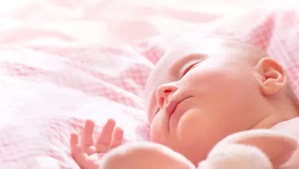 De când poate dormi copilul pe pernă?
