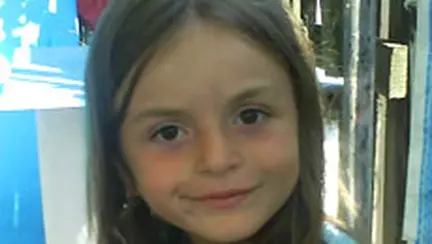 Fetita care iubeste animalele