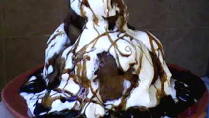 Papanasi cu smantana si dulceata