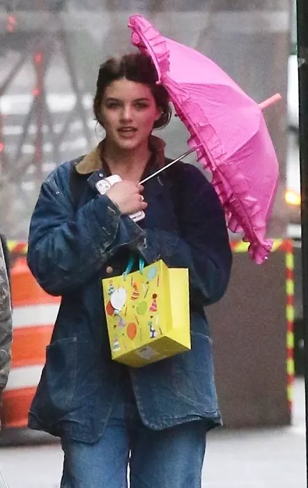 Suri Cruise steps out with present in hand on her 18th birthday in NYC